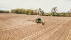 Tractor on bare field