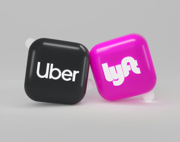 Uber and Lyft logos