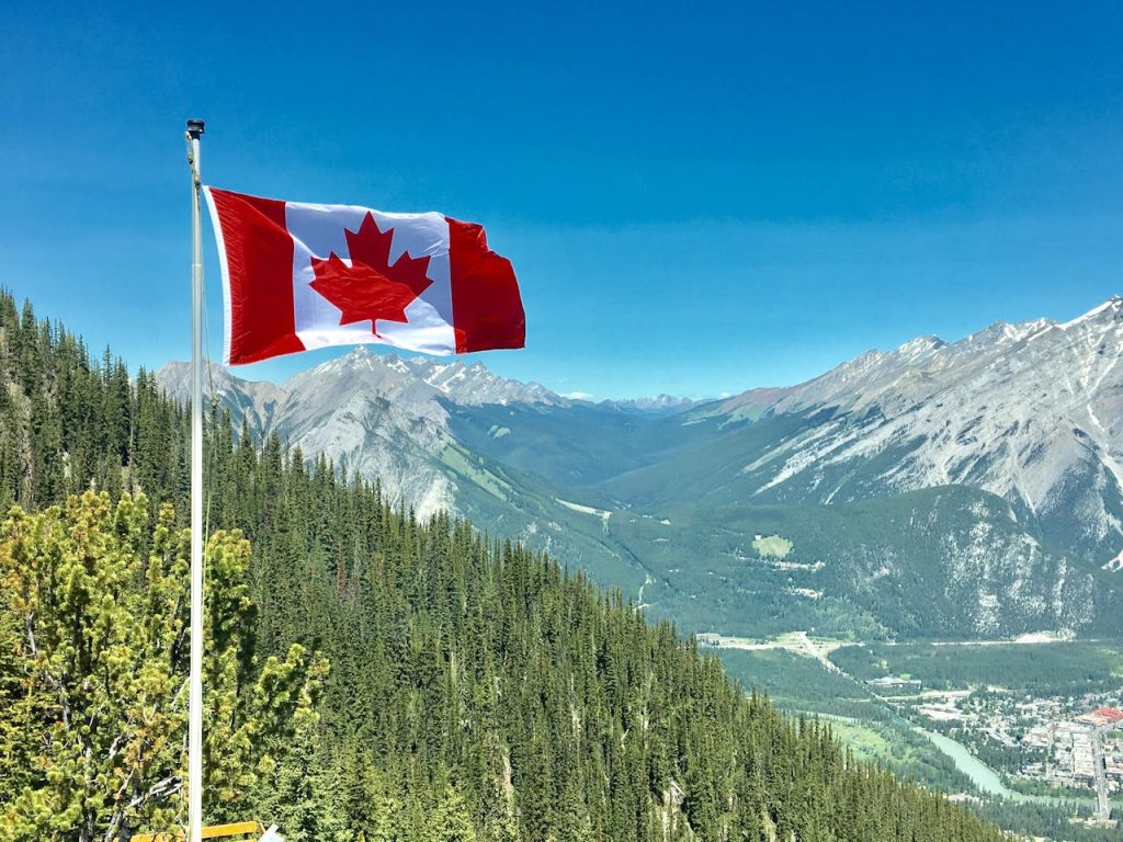 Canadian flag in the mountains