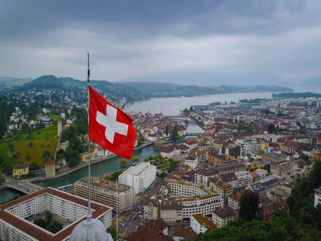 Swiss flag overlooking city