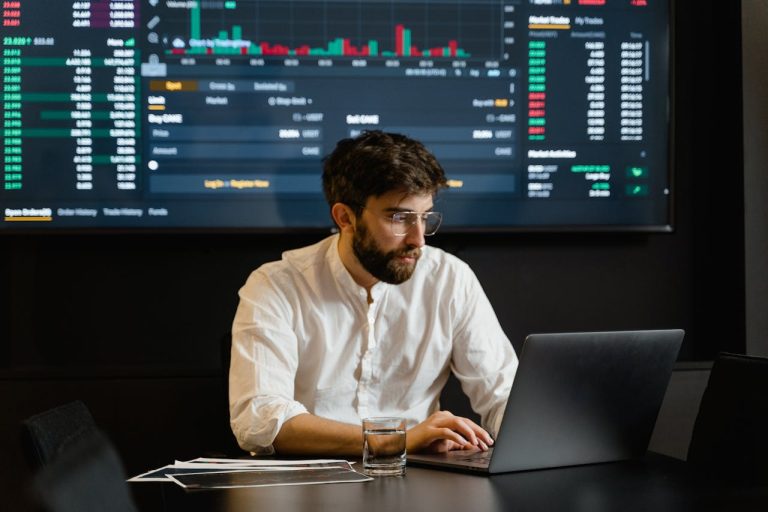 Investor observing market indexes